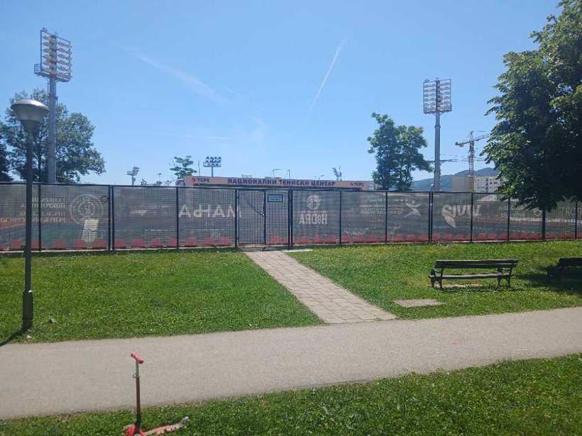 Park path by the stadium — Gradski stadion behind the trees, Banja Luka