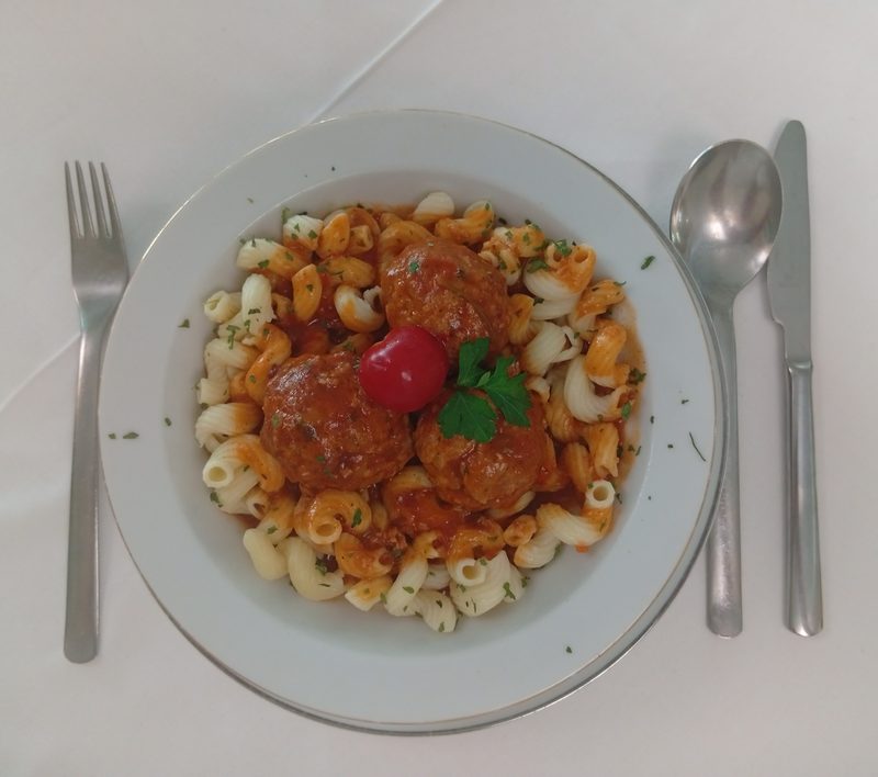 Ćufte s makaronama — Bosnian meatballs in tomato sauce with macaroni, a hearty regional favourite, Banja Luka