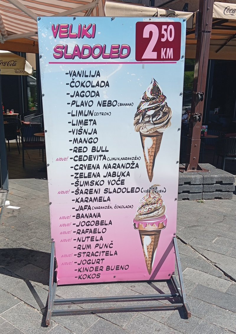 Sladoled ice cream flavour board in Banja Luka — 24 flavours at 2.50 KM, from vanilla to Nutella and Kinder Bueno